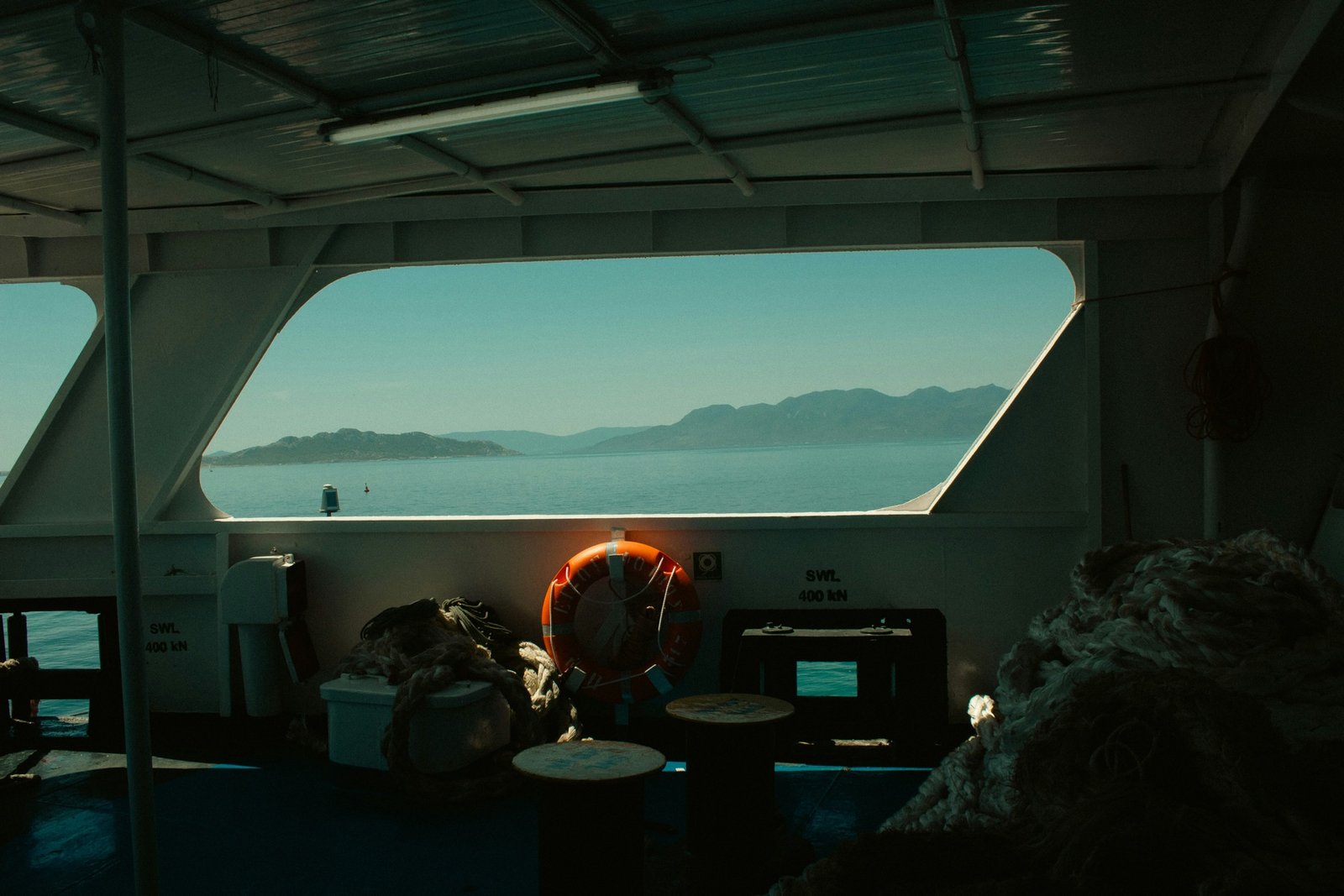 Sea and islands viewed from a ship cabin window